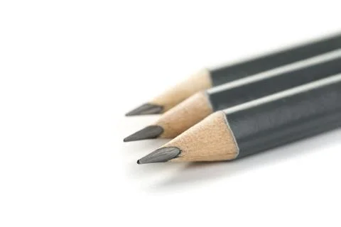 Three  gray triangular pencil isolated.on white background Foto stock