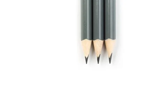 Three  gray triangular pencil isolated.on white background Stock Photos