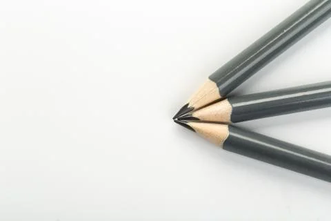 Three  gray triangular pencil isolated.on white background Stock Photos