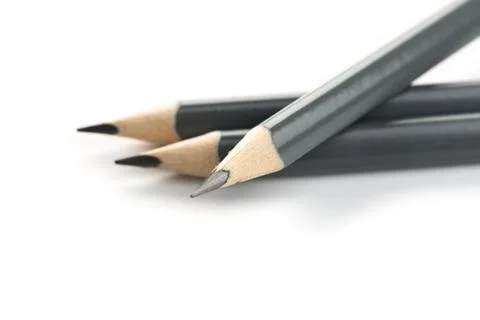 Three  gray triangular pencil isolated.on white background Stock Photos