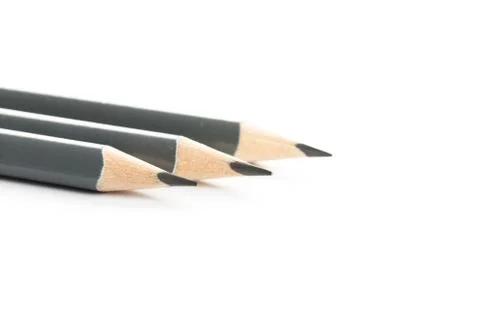 Three  gray triangular pencil isolated.on white background Stock Photos