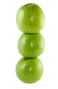 Three green apples Stock Photos
