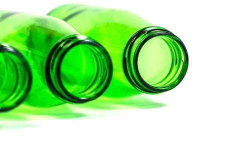 Three Green Bottles on White Background with focus on Right Bottle Stock Photos