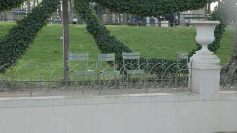 Three Green Chairs in Focus Inside Peaceful Parc du Luxembourg Paris France Stock Footage 323238508