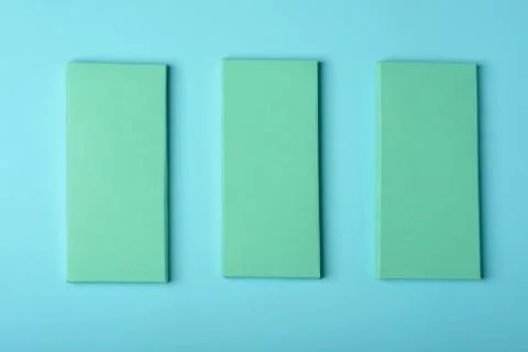 Three green equal rectangles on blue background Stock Photos