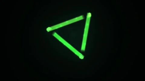 Three Green Glow Sticks Form a Triangle Shape on Black Background. Stock Footage 334542706