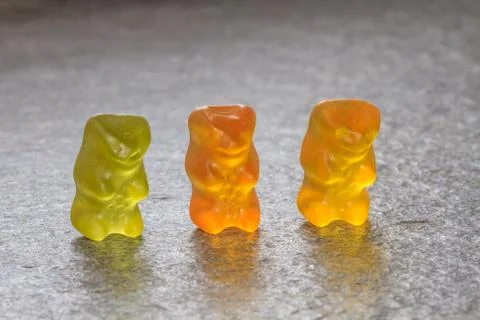 Three gummy bears in a row Stock Photos