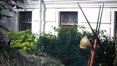 Three guns, from the time of the First World War, stand on the ground with each  스톡 동영상 123570476