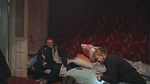 Three guys have fun chatting before going to bed Stock-Footage 231711938