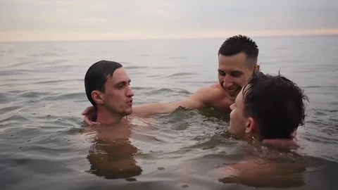 Three guys having fun in the water 스톡 동영상 90811717