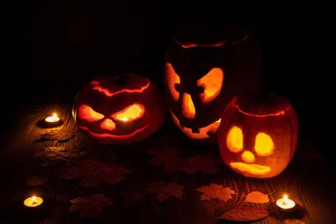 Three halloween jack o lantern pumpkins Foto stock