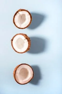 Three halves of coconut Stock Photos