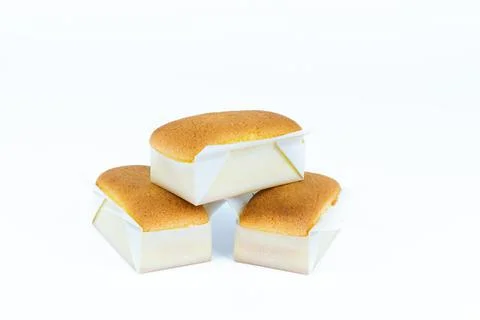 Three handmade madeleines on white background. Pastry bakery on isolated Stock Photos