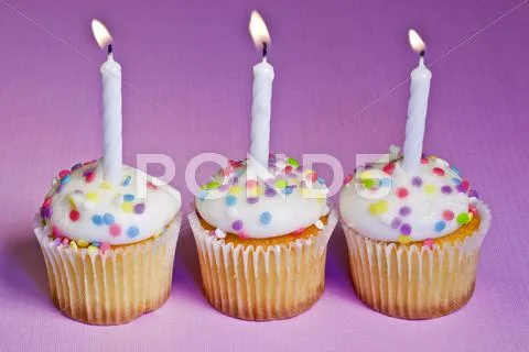 Three happy birthday cupcakes Stock Photos