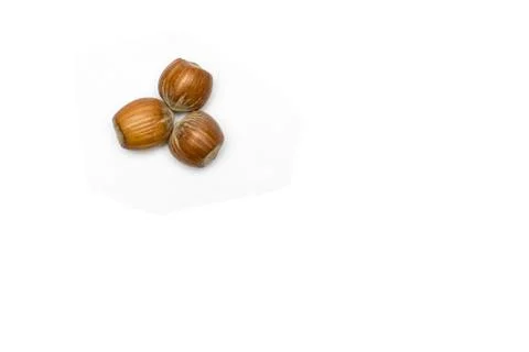 Three hazelnuts Stock Photos
