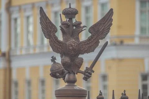 Three-headed eagle with sword and sceptre of power symbol of tsarist Russia Fotos Stock