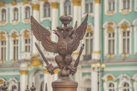 Three-headed eagle with sword and sceptre of power symbol of tsarist Russia Фото