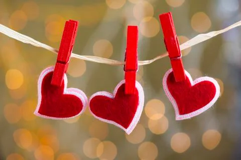 Three hearts hanging 스톡 사진