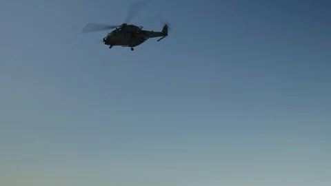 Three helicopters flying above in formation Stock Footage 110826326