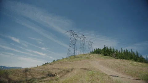 Three high voltage power line towers near Hood River Oregon Stock Footage 232428125