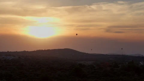 Three Hot Air Balloons Floating in the Sky at Sunset Stock Footage 249225272
