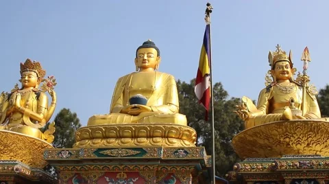 Three huge Buddha and flag Stock Footage 59182637