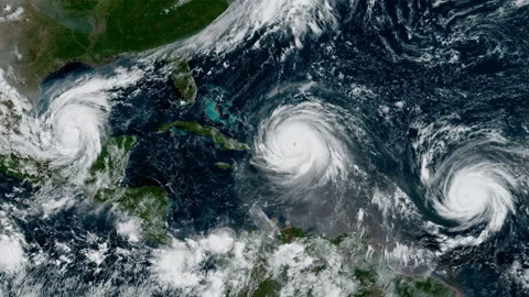 Three hurricanes at once from left to right. Katia, Irma, and Jose zoom out Stock Footage 236445642