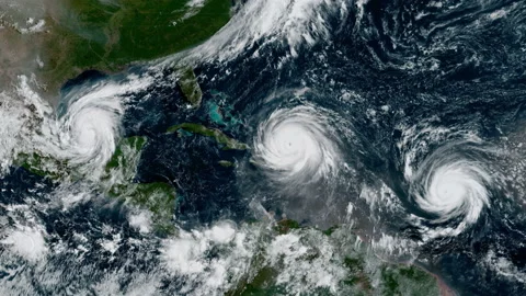 Three hurricanes at once from left to right. Katia, Irma, and Jose zoom in Stock Footage 236445662