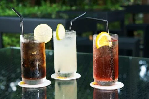 Three ice cold drinks Stock Photos
