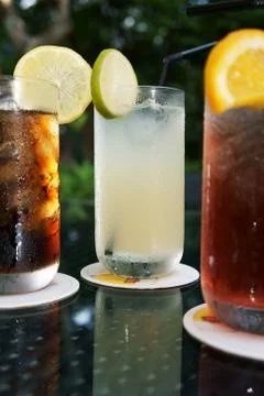 Three ice cold drinks Stock Photos