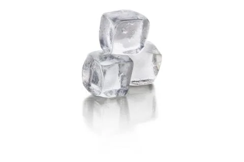 Three ice cubes. isolated on white background with reflection. Ideal for beve Stock Photos