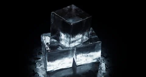 Three ice cubes with spot lighting 3d-rendering Foto stock