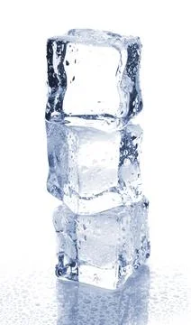 Three ice cubes with water drops Stock Photos