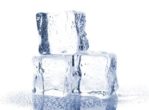 Three ice cubes with water drops Stock Photos