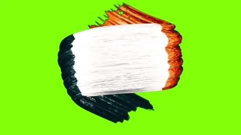 Three identical tricolor paint brush strokes rotating against vibrant green Stock Footage 346121255