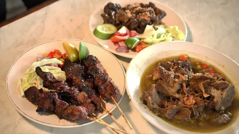 Three Indonesian food courses featuring a variety of traditional dishes. Stock Footage 310814908
