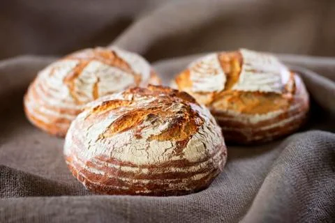 Three industrial round rye bread Stock Photos