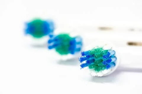 Three interchangeable heads for a electric toothbrush Stock Photos
