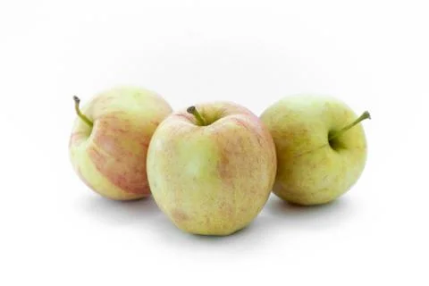 Three isolated apples on a white background Stock Photos