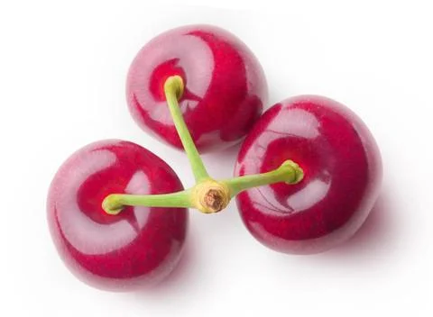 Three isolated cherries top view Stock Photos