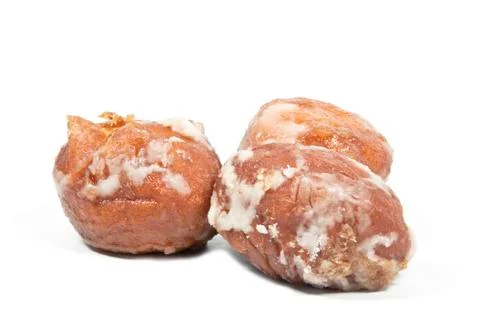 Three isolated mini-donuts covered in sweet icing Stock Photos