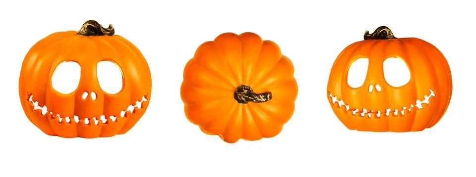 Three Isolated Pumpkin head Jack-o'-lantern close-up on white background Foto stock