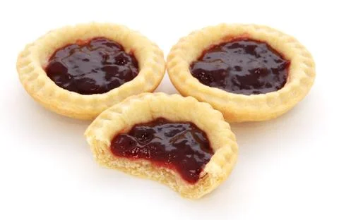 Three jam tarts, one with a bite taken Stock Photos