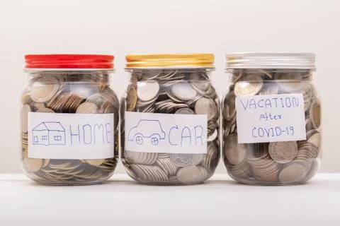 Three Jar, Saving Coins, Saving Money. Save Coin in Jar for vacation after CO Stock Photos