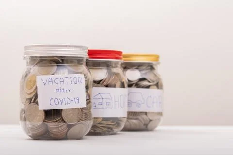 Three Jar, Saving Coins, Saving Money. Save Coin in Jar for vacation after CO Stock Photos