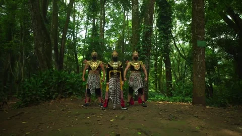Three Javanese Warriors Standing Guard in Forest Clearing Stock Footage 276348377