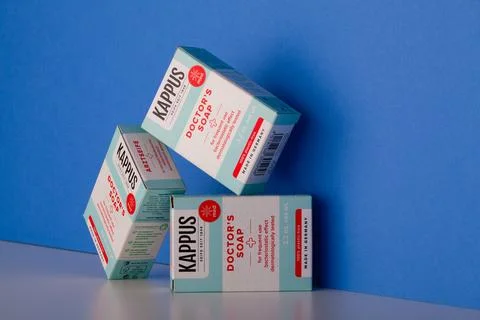 Three KAPPUS Doctors Soap on the blue background. 스톡 사진