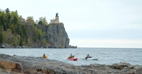 Three Kayakers on Lake in Split Rock Forest, 4K Kayaking Slow Motion Stock Footage 115043060