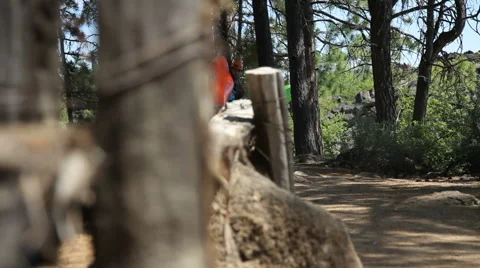 Three kayakers walk along path 스톡 동영상 61669955