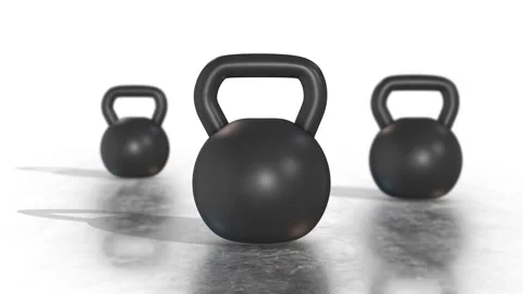 Three Kettlebells on a White Reflective Floor. Kettlebells Weight Lifts. 4K Stock Footage 292619698